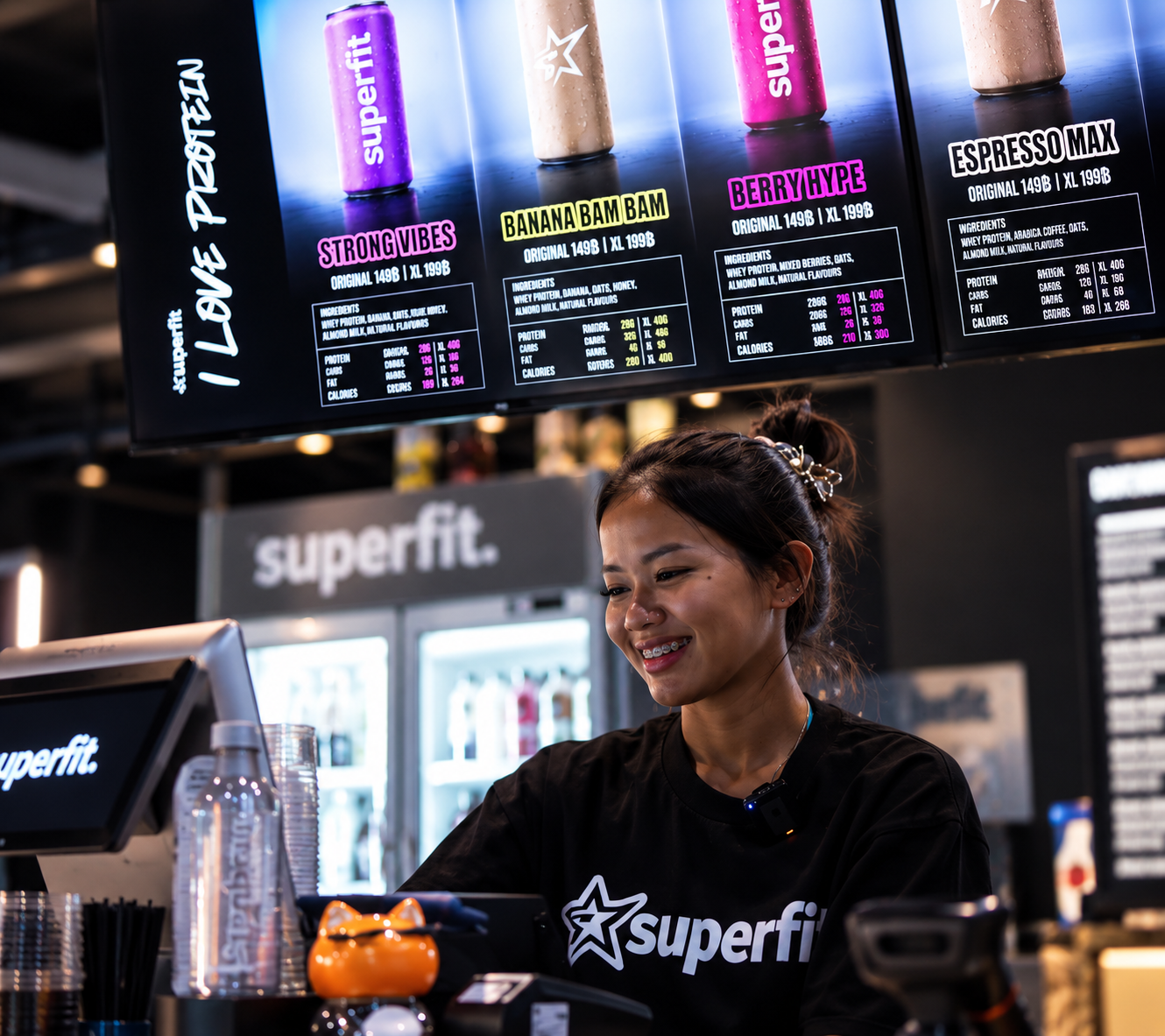 Superfit Cafe team member at the counter